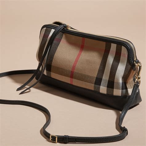 burberry house check and leather clutch bag black|burberry clutch bag sale.